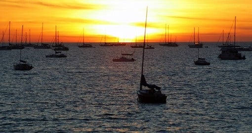 You will be able to see boats resting at sunset during your Australia vacations.