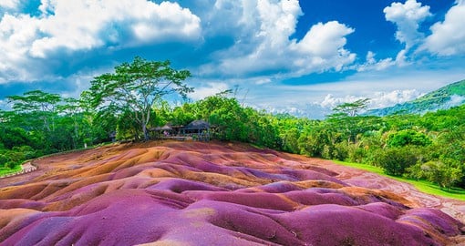 Capture the vibrant colours of the 7 Coloured Earth, a paradise layered with sensational shades of soil