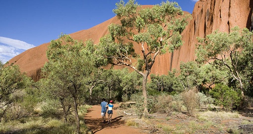 Experience the magic of a sunrise while trekking to Uluru on your Australia Vacation
