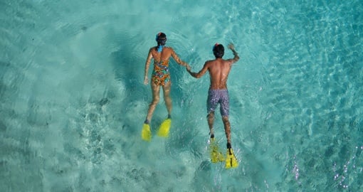 Couple snorkeling on honeymoon
