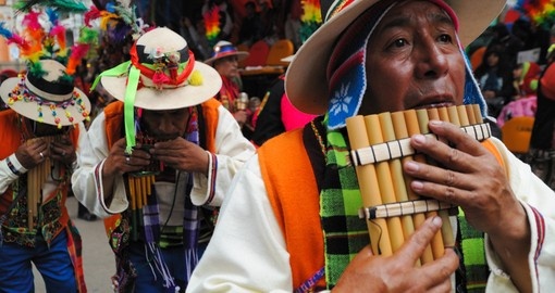 People participate in the Oruro costume carnival