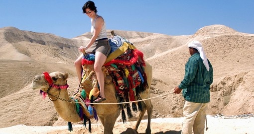 Tourist rides a camel