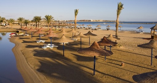 Beach umbrella on the shore of the Red Sea