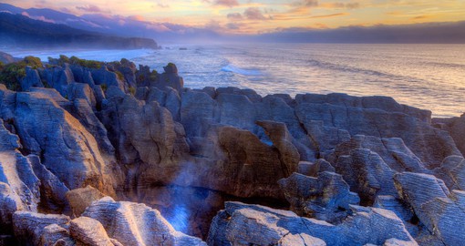 Experience tranquility while viewing the amazing Pancake Rocks, limestone formations that began forming over 30 millions years ago