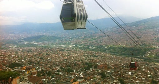 Experience the thrill on board the cable car in Medellin which will highlight the development of this historic city