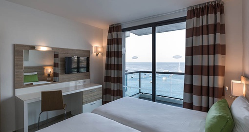 Relax in a deluxe room on your Malta vacation