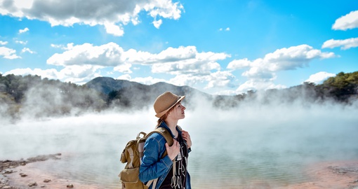Young woman at geyser outside Rotorua