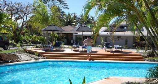 Dive into the clear waters of the Lagoon Breeze Villas pool during your Cook Island Vacations