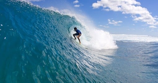 Learn to surf and try other water sports on your Tonga vacation