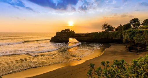Tanah Lot is a stunning sea temple, perched on a rock formation, offering breathtaking sunsets and a glimpse into the Bali's rich cultural heritage.