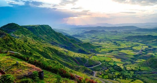Capture the awe of the Simien Mountains, famous for their jagged peaks, dramatic cliffs, and endangered species