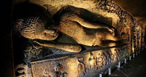 Ajanta Cave with sleeping Buddha statue is a great photo opportunity on India vacations.