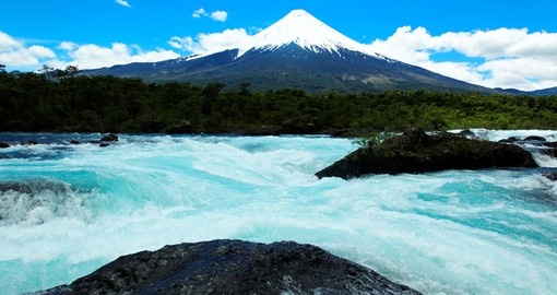 One of Puerto Varas icon locations, Petrohue Falls with Osorno Volcano, and a highlight on all Chile vacations