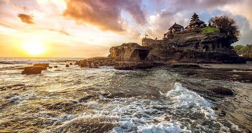 Journey to the Tanah Lot to experience the beauty of this seaside Temple