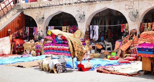 Delve deep into the Qatari culture and traditions as you explore a local market with a range of perfumes and fabrics