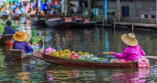 Visit Bangkok's legendary floating markets