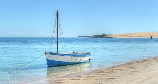 A boat on the shores of Benguerra Island makes for a great photo opportunity on your Mozambique vacation.