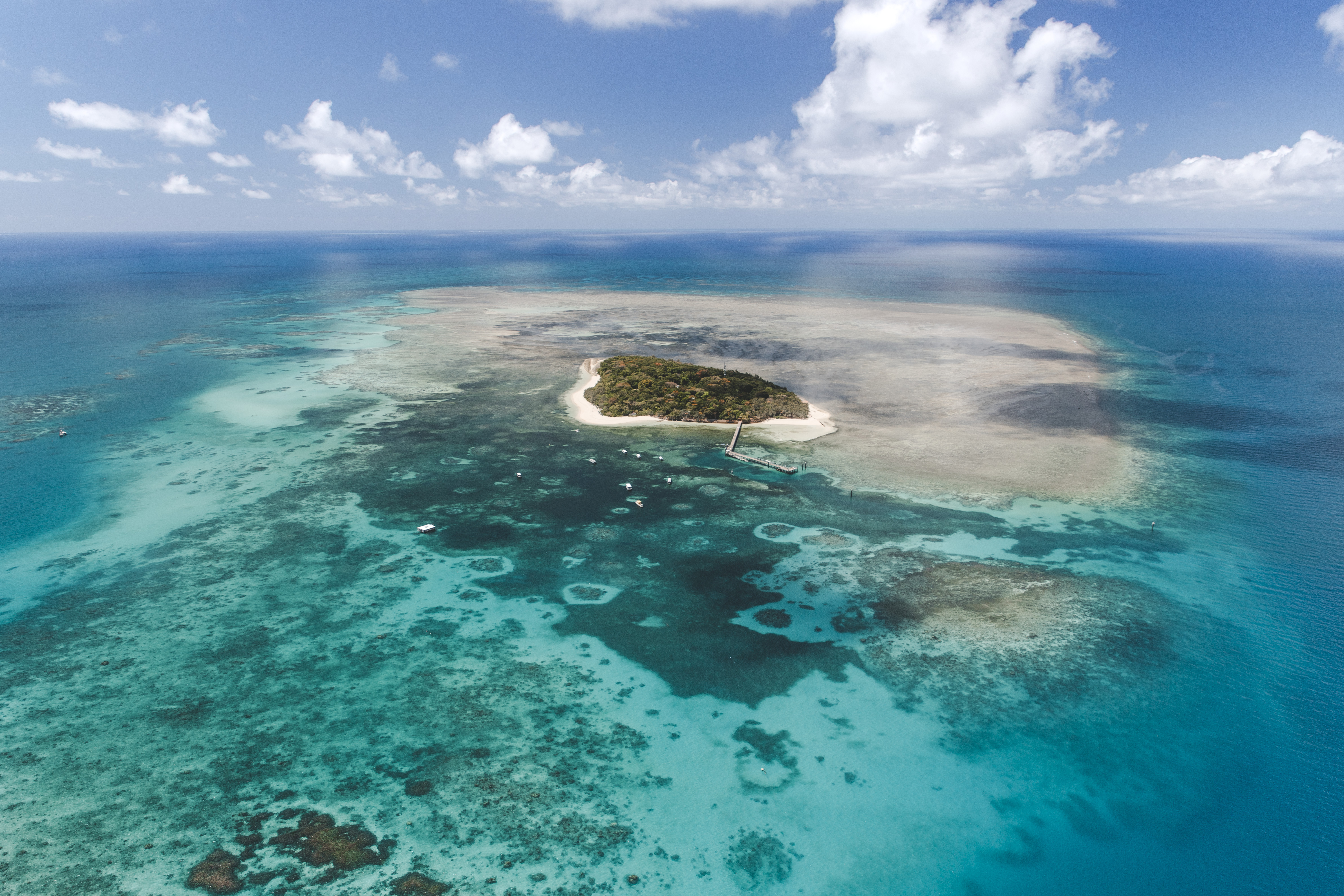 Aerial view of an island in the Great Barrier Reef.