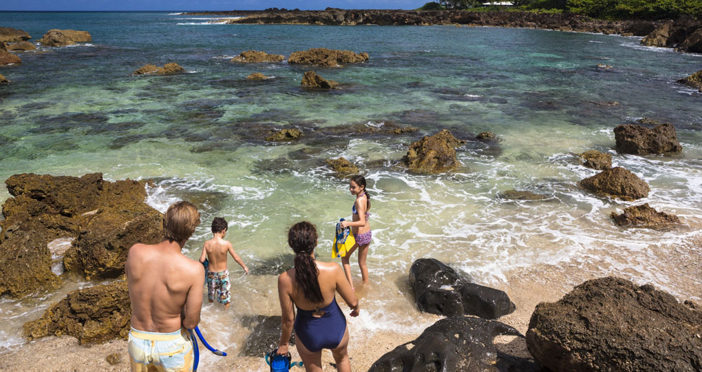 Family swimming Hawaii