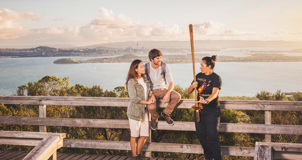 Tourist learning Maori traditions