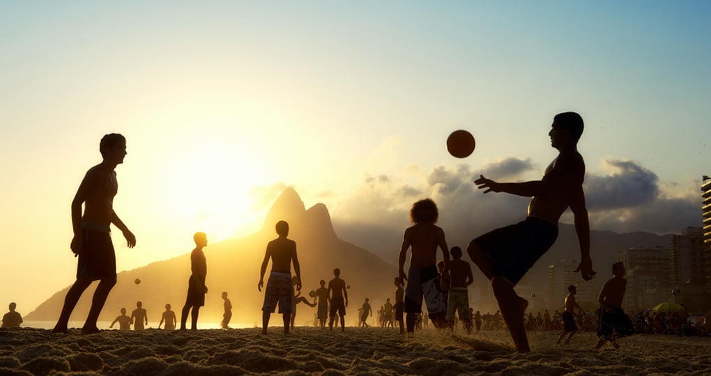 People playing at sunset on Ipanema Beach, Rio de Janeiro